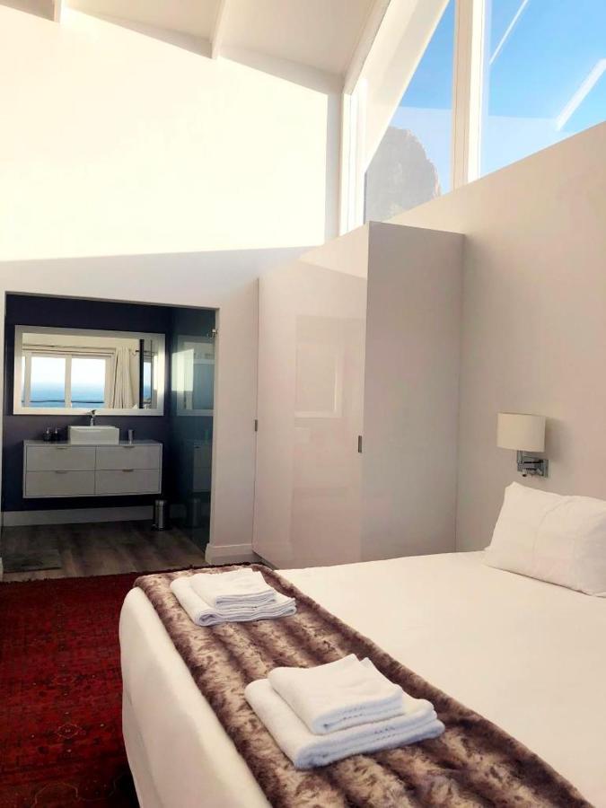 ケープタウンBright Camps Bay Loft With Stunning Views And Shared Poolアパートメント エクステリア 写真